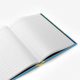 Custom hardcover notebook open with lined pages.