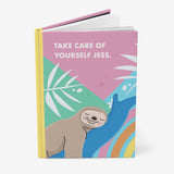 Notebook cute design with a sloth illustration.