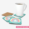 Personalized Cork Coasters with a Rainbow Design with Mug (not included).